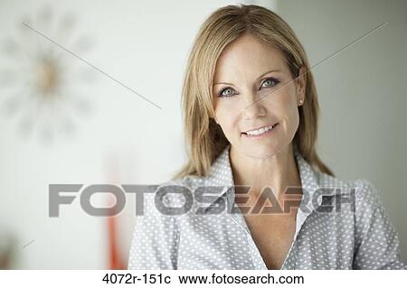 Portrait of a businesswoman smiling View Large Photo Image Stock Image - Portrait of a businesswoman smiling. Fotosearch