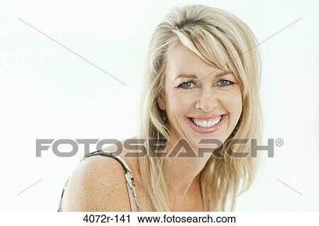 Stock Image - Portrait of a mature woman smiling. Fotosearch