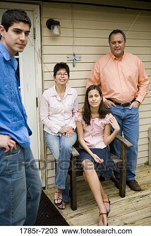 Portrait of a Mexican-American family View Large Photo Image Stock Image - Portrait of a Mexican-American family. Fotosearch