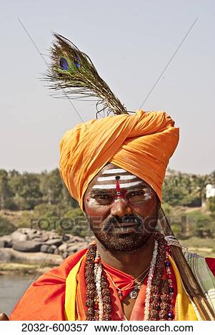 Stock Photo - Portrait of a sadhu, Hampi, Karnataka, India. Fotosearch