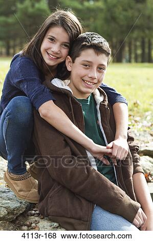 Portrait of brother and sister outdoors View Large Photo Image Stock Photo - Portrait of brother and sister outdoors. Fotosearch