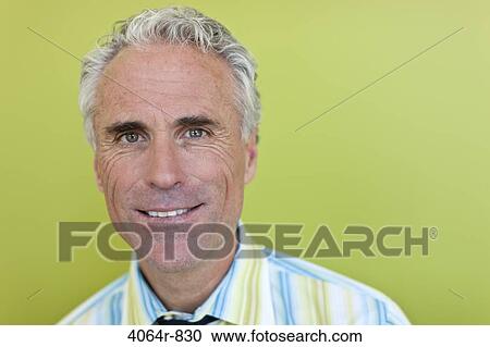 Portrait of cheerful mature businessman View Large Photo Image Stock Image - Portrait of cheerful mature businessman. Fotosearch