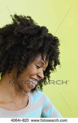Portrait of cheerful mid adult woman View Large Photo Image Stock Image - Portrait of cheerful mid adult woman. Fotosearch
