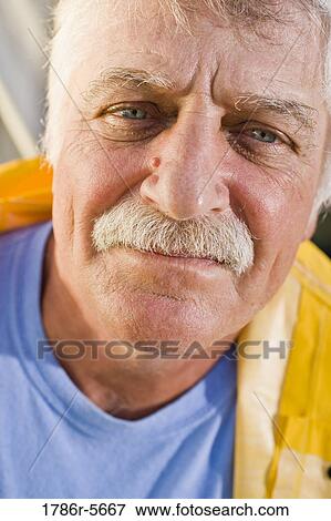 Portrait of content senior man View Large Photo Image Stock Photo - Portrait of content senior man. Fotosearch
