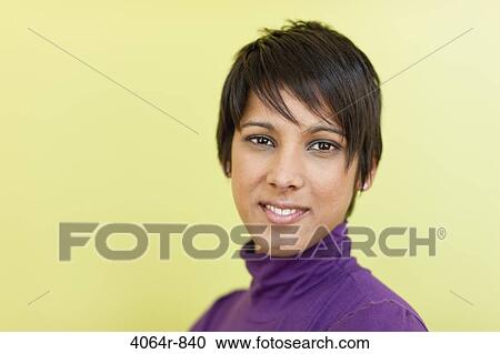 Stock Image - Portrait of happy businesswoman. Fotosearch