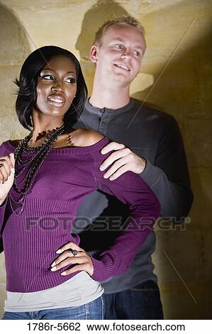 Portrait of stylish young interracial couple View Large Photo Image Stock Image - Portrait of stylish young interracial couple. Fotosearch