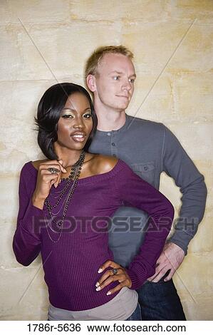 Portrait of stylish young interracial couple View Large Photo Image Stock Photograph - Portrait of stylish young interracial couple. Fotosearch