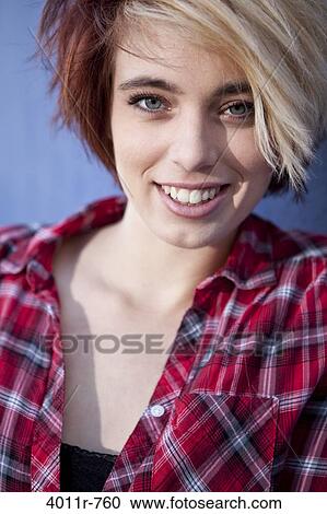 Portrait of teenage girl wearing lumberjack shirt View Large Photo Image Stock Image - Portrait of teenage girl wearing lumberjack shirt. Fotosearch