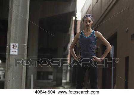 Portrait of woman in workout wear View Large Photo Image Picture - Portrait of woman in workout wear. Fotosearch