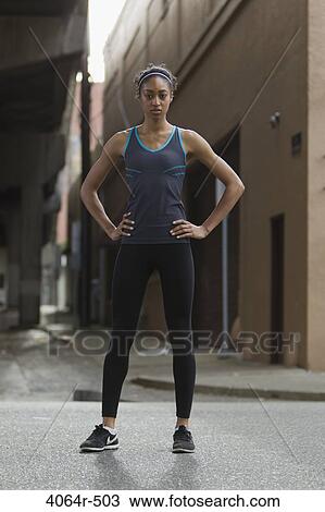 Portrait of woman in workout wear View Large Photo Image Stock Image - Portrait of woman in workout wear. Fotosearch