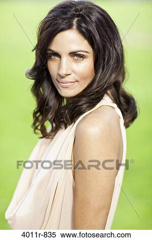 Portrait of woman standing outdoors View Large Photo Image Stock Photography - Portrait of woman standing outdoors. Fotosearch