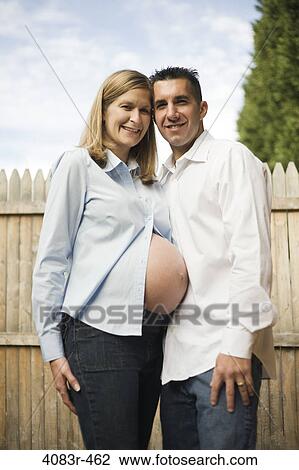 Stock Image - Pregnant woman with her husband. Fotosearch