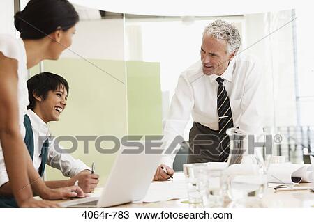 Project discussions amongst employees in boardroom View Large Photo Image Stock Image - Project discussions amongst employees in boardroom. Fotosearch