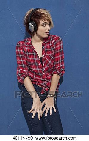Punk girl wearing headphones View Large Photo Image Stock Image - Punk girl wearing headphones. Fotosearch