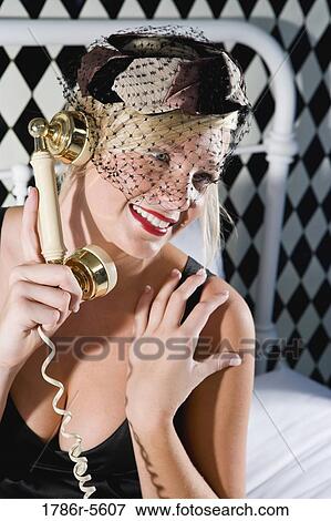 Retro pin-up girl on telephone View Large Photo Image Stock Photo - Retro pin-up girl on telephone. Fotosearch