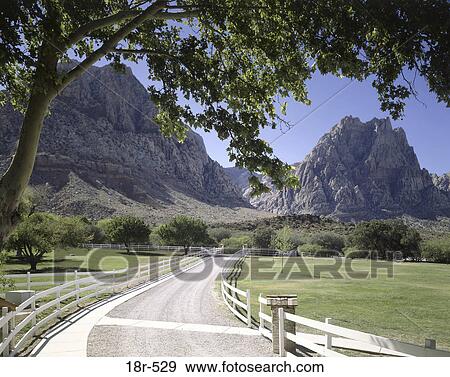 Road leading to mountains View Large Photo Image Stock Photo - Road leading to mountains. Fotosearch