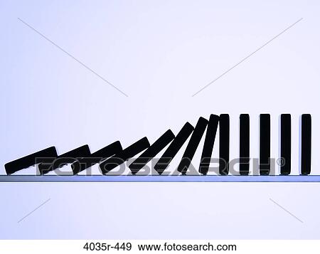 Row of dominos tumbling View Large Photo Image Stock Photo - Row of dominos tumbling. Fotosearch