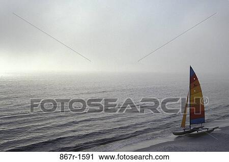 Sailboat in the sea View Large Photo Image Stock Image - Sailboat in the sea. Fotosearch