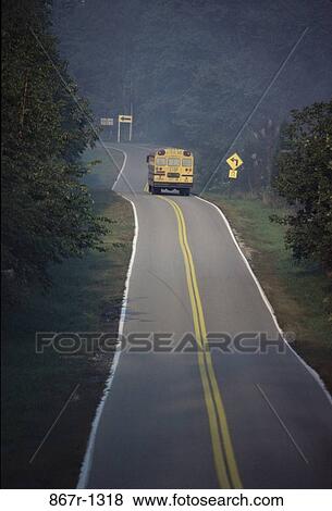 School bus on the road View Large Photo Image Stock Photo - School bus on the road. Fotosearch