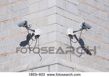security video cameras each side of a wall corner View Large Photo Image Stock Image - security video cameras each side of a wall corner. Fotosearch