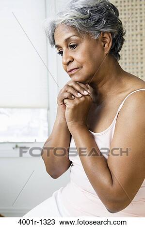 Senior woman thinking and looking sad View Large Photo Image Stock Image - Senior woman thinking and looking sad. Fotosearch