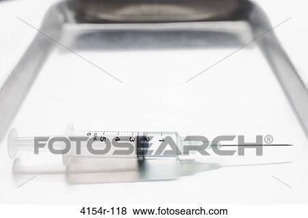 Single surgical needle on tray View Large Photo Image Stock Photo - Single surgical needle on tray. Fotosearch
