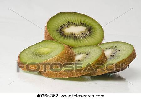Slices of kiwi fruit View Large Photo Image Stock Image - Slices of kiwi fruit. Fotosearch