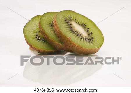 Slices of kiwi fruit View Large Photo Image Stock Photograph - Slices of kiwi fruit. Fotosearch