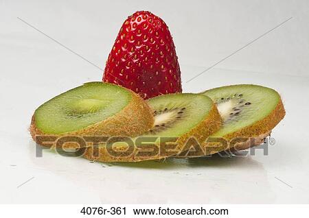 Stock Image - Strawberry and slices of kiwi fruit. Fotosearch