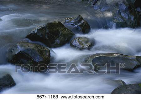 Stock Photo - Stream with rocks. Fotosearch
