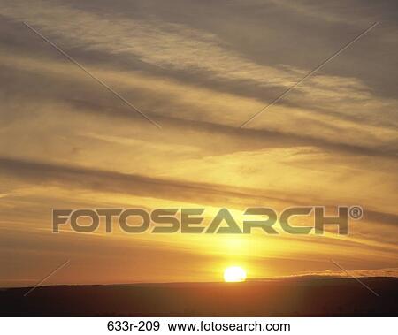 Sunset over a landscape View Large Photo Image Stock Photo - Sunset over a landscape. Fotosearch