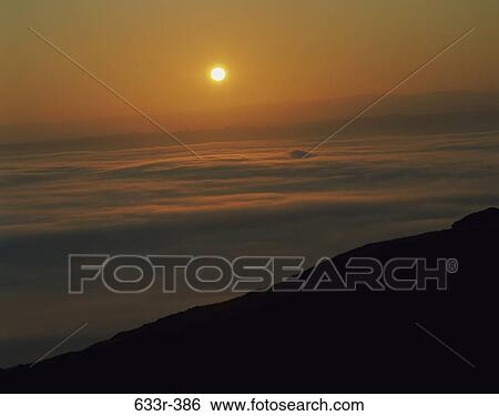Sunset over a landscape View Large Photo Image Stock Photograph - Sunset over a landscape. Fotosearch