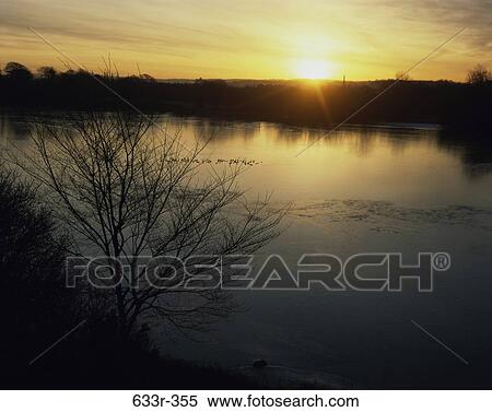 Sunset over the Duddingston Loch, Edinburgh, Scotland View Large Photo Image Stock Photography - Sunset over the Duddingston Loch, Edinburgh, Scotland. Fotosearch