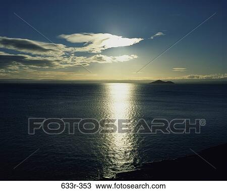 Sunset over the ocean, Firth of Forth, Scotland View Large Photo Image Stock Image - Sunset over the ocean, Firth of Forth, Scotland. Fotosearch