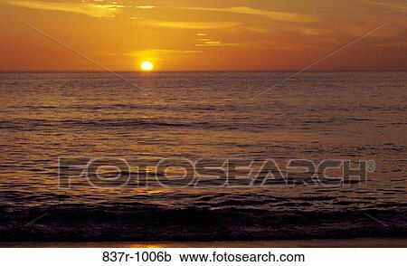 Sunset over the ocean, Sanibel Island, Florida, USA View Large Photo Image Stock Image - Sunset over the ocean, Sanibel Island, Florida, USA. Fotosearch