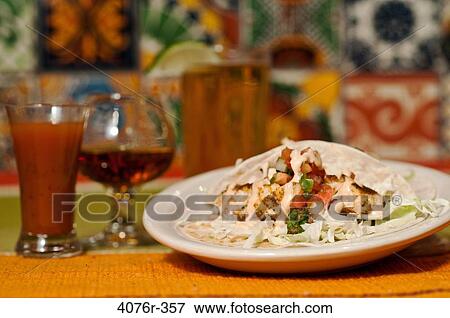 Stock Photo - Taco fish on table. Fotosearch