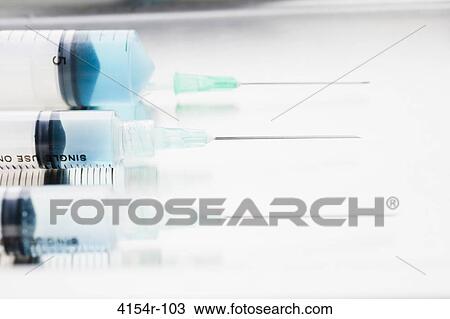 Three surgical needles in a row View Large Photo Image Stock Image - Three surgical needles in a row. Fotosearch