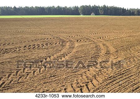 Tire track prints on an open field, Bavaria, Germany View Large Photo Image Stock Image - Tire track prints on an open field, Bavaria, Germany. Fotosearch