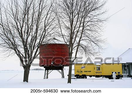 Train and old water tank in winter, Minnesota, USA View Large Photo Image Stock Image - Train and old water tank in winter, Minnesota, USA. Fotosearch
