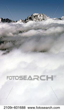 USA, California, Sierra Nevada, Mt. Williamson covered with clouds View Large Photo Image Stock Photo - USA, California, Sierra Nevada, Mt. Williamson covered with clouds. Fotosearch