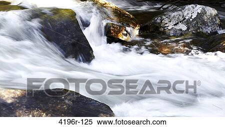 USA, Colorado, Close-up of flowing stream View Large Photo Image Stock Photography - USA, Colorado, Close-up of flowing stream. Fotosearch