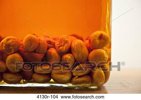 USA, New York City, Manhattan, close up of fruits and spices in syrup View Large Photo Image Picture - USA, New York City, Manhattan, close up of fruits and spices in syrup. Fotosearch