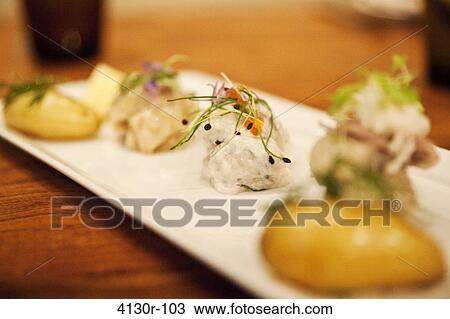 USA, New York City, Manhattan, close up of assorted pickled herring View Large Photo Image Stock Image - USA, New York City, Manhattan, close up of assorted pickled herring. Fotosearch
