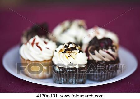 USA, New York State, New York City, Red Hook Mercados, Assorted cupcakes on paper plate View Large Photo Image Stock Image - USA, New York State, New York City, Red Hook Mercados, Assorted cupcakes on paper plate. Fotosearch