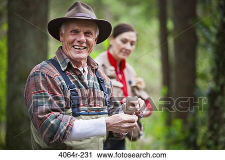 USA, Washington, Vancouver, Couple getting ready for fishing View Large Photo Image Stock Image - USA, Washington, Vancouver, Couple getting ready for fishing. Fotosearch