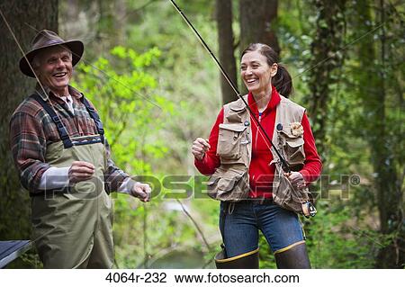 USA, Washington, Vancouver, Couple getting ready for fishing View Large Photo Image Stock Image - USA, Washington, Vancouver, Couple getting ready for fishing. Fotosearch