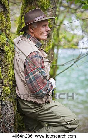 USA, Washington, Vancouver, Portrait of smiling senior fisherman View Large Photo Image Stock Photograph - USA, Washington, Vancouver, Portrait of smiling senior fisherman. Fotosearch