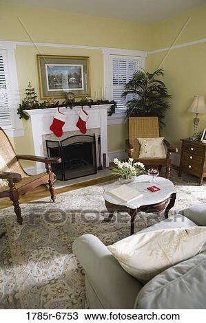 View of a living room interior decorated for Christmas View Large Photo Image Stock Image - View of a living room interior decorated for Christmas. Fotosearch