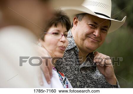 View of a smiling mature Tex-Mex couple View Large Photo Image Stock Image - View of a smiling mature Tex-Mex couple. Fotosearch