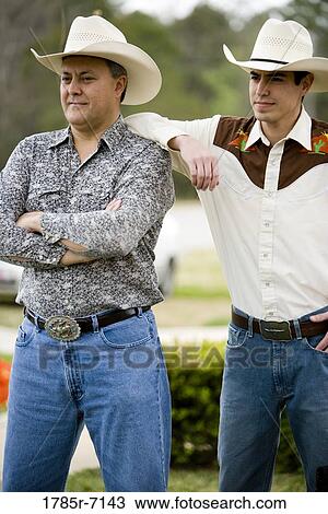 View of Tex-Mex father and son standing together View Large Photo Image Stock Image - View of Tex-Mex father and son standing together. Fotosearch
